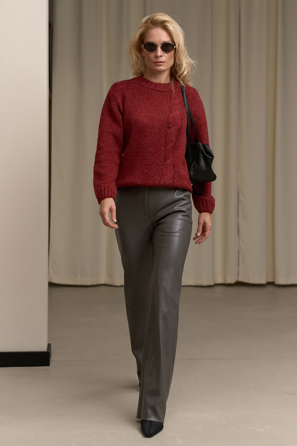 Textured wool cable knit sweater with relaxed silhouette