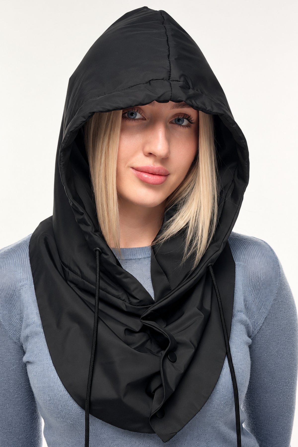 Black satin-lined waterproof hooded scarf styled over a coat