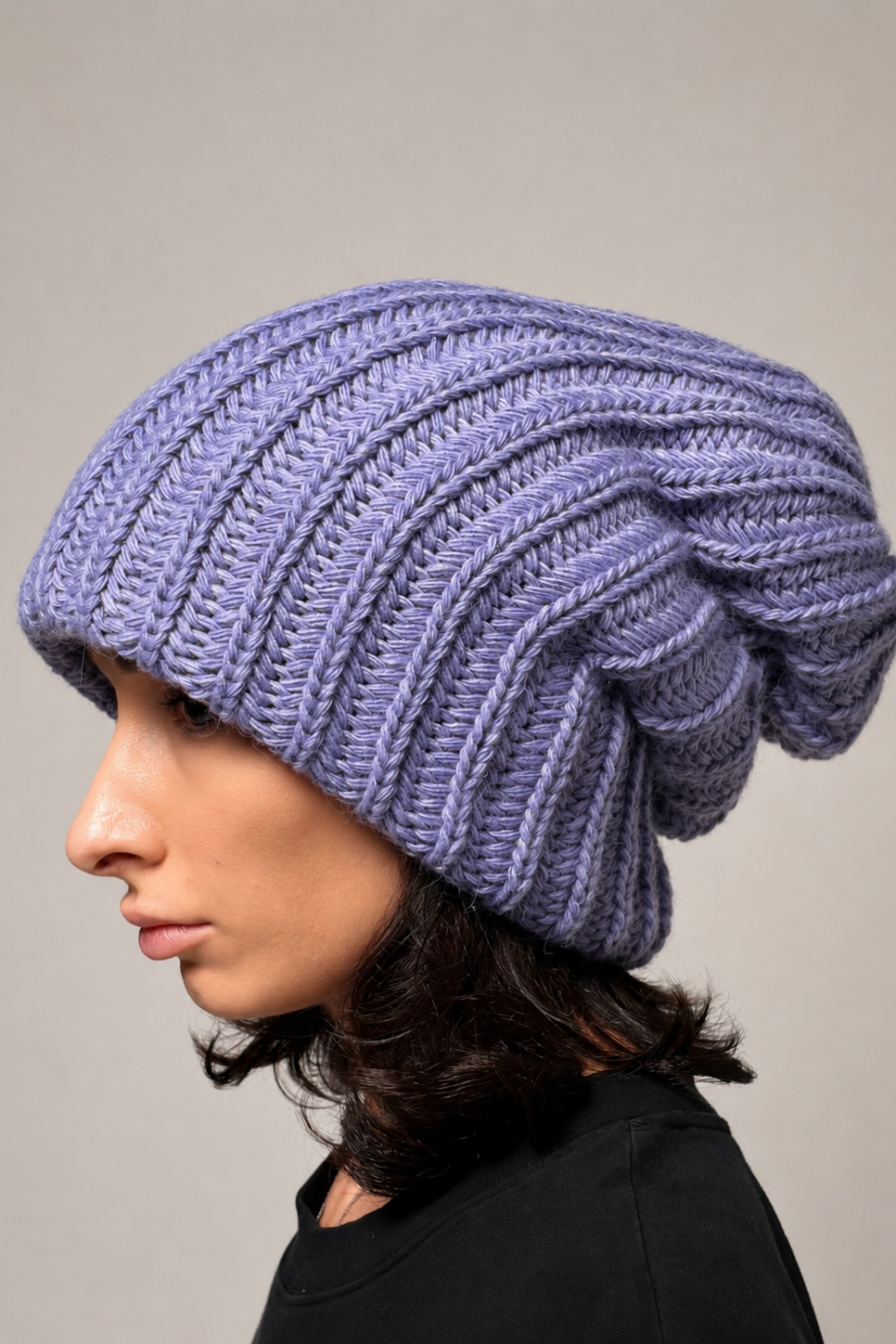 Lavender oversized chunky knit beanie styled with a relaxed slouchy fit