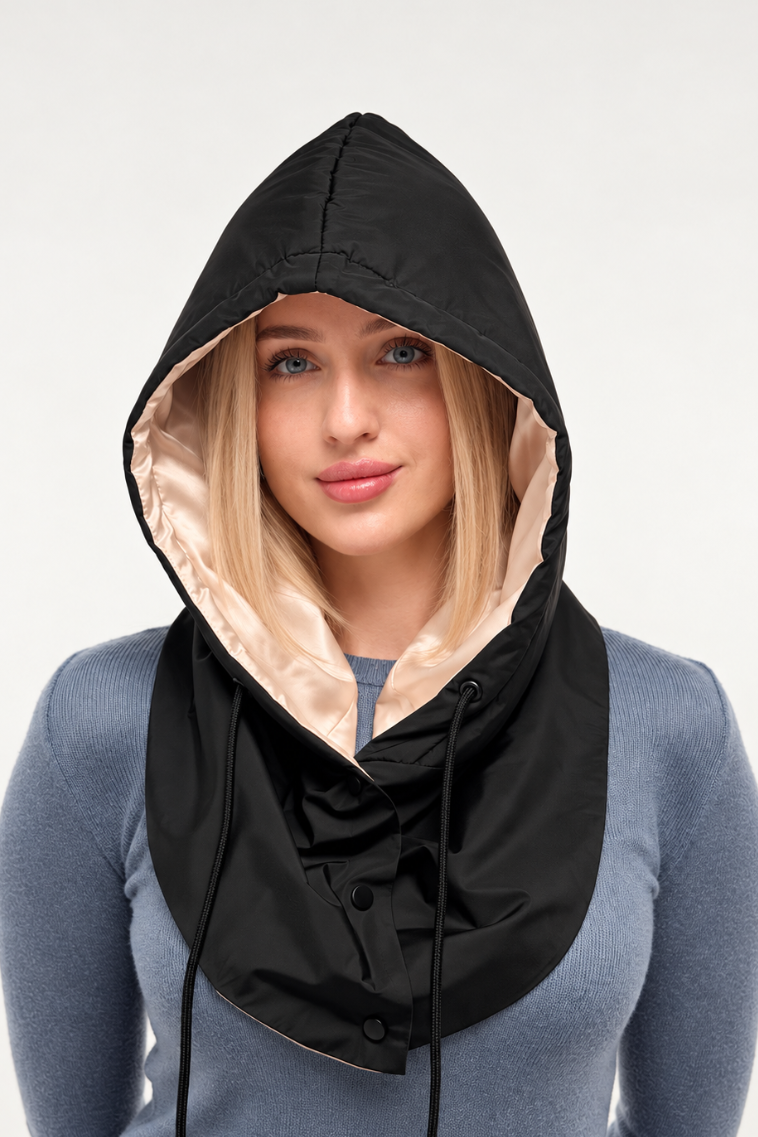 Ivory peach satin-lined waterproof hooded scarf worn as a rain hood
