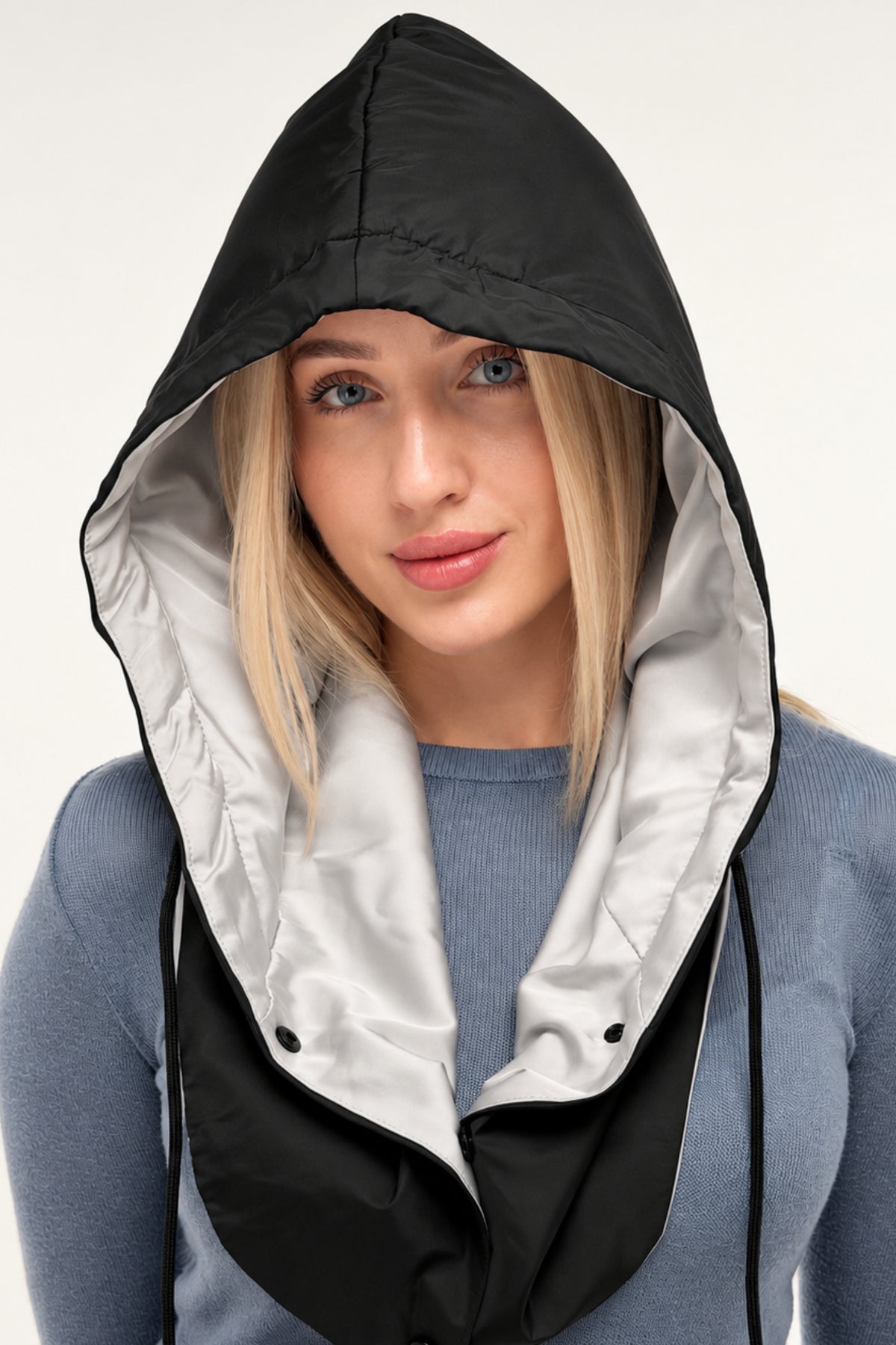 Silver satin-lined waterproof hooded scarf worn for head and neck coverage